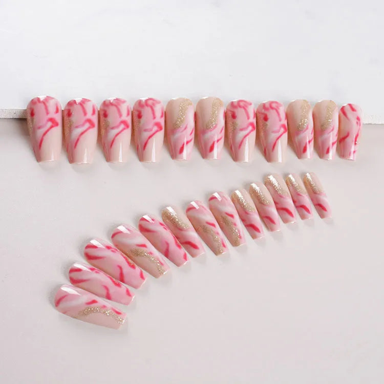Wearable manicure set showing 24 artificial nails with rose, tulip, leopard and XINGX designs