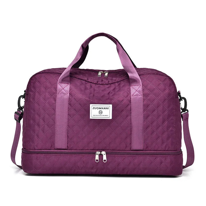 Large Oxford cloth travel holdall in a solid colour, shown with a capacity of 36-55 litres for buggies and luggage.