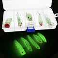Set of five 3D fluorescent hard fishing lures with luminous details on a blue background.