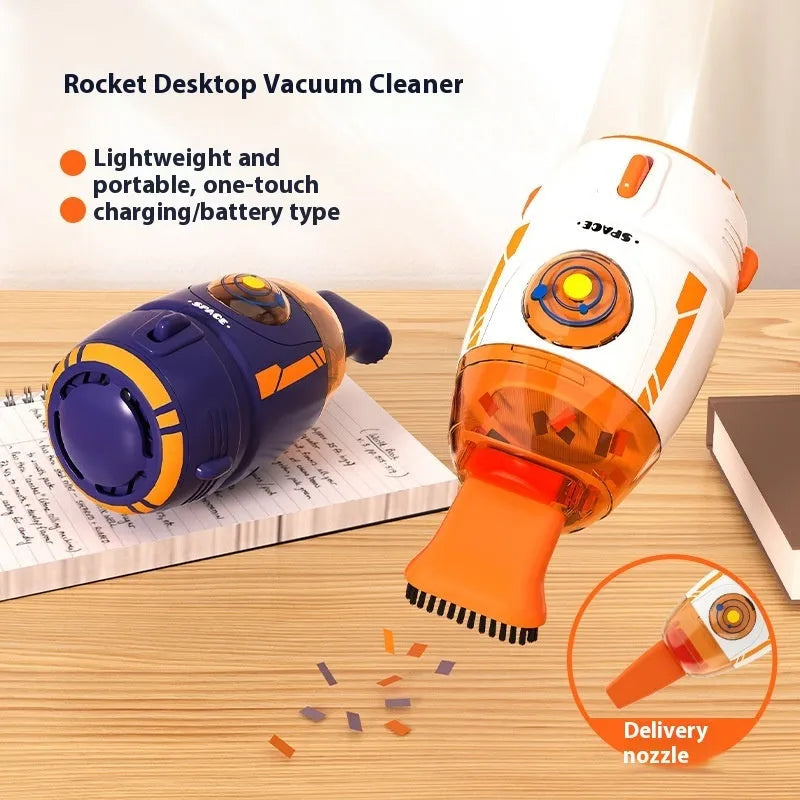 USB handheld desktop vacuum cleaner in blue rocket design on a wooden desk.