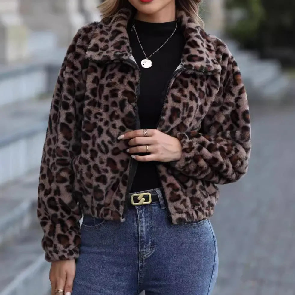 Women's loose leopard print plush coat with front zipper and raglan sleeves.