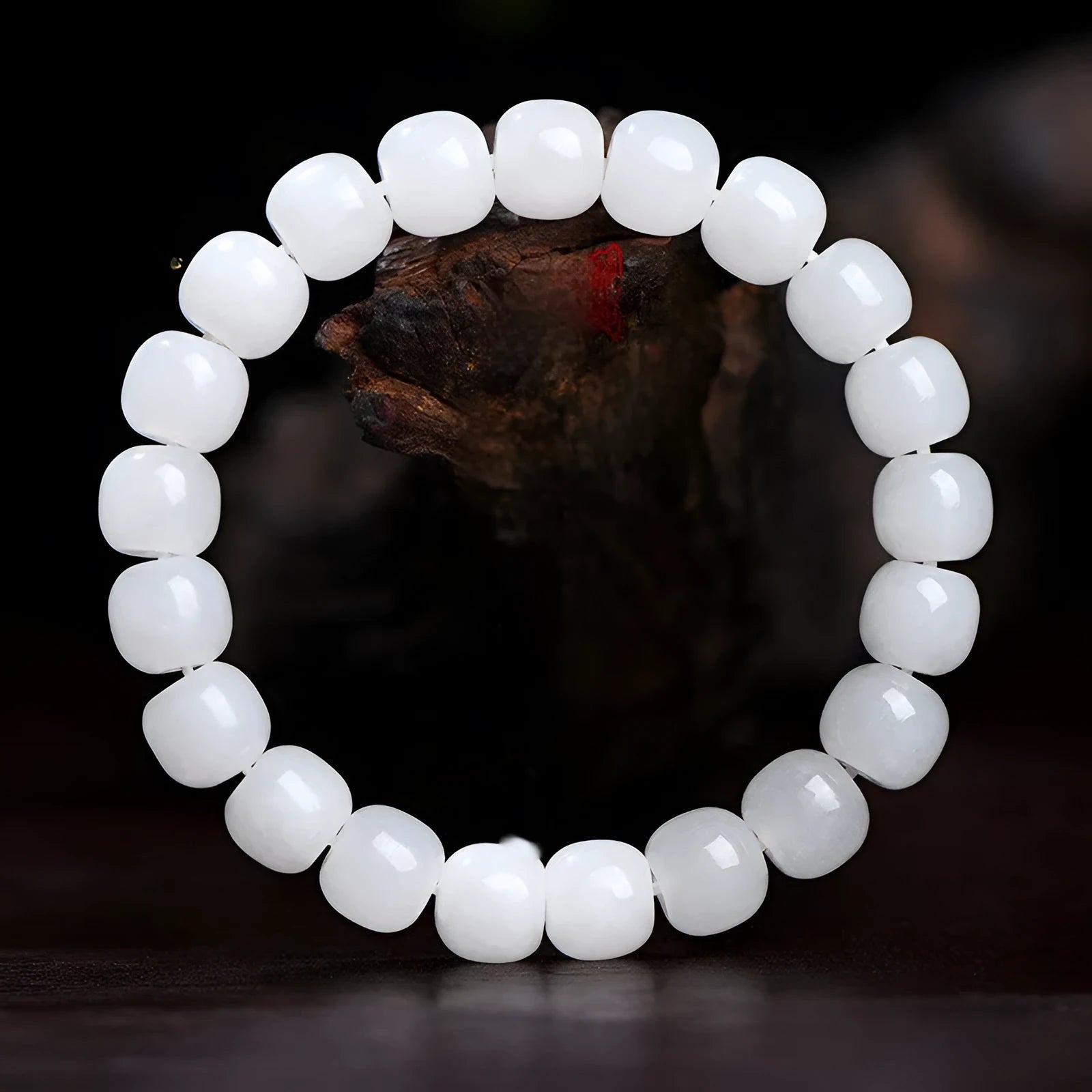 White Hetian jade barrel beads bracelet laid flat, showing bead sizes 5x6mm, 7x8mm, and 8x10mm.