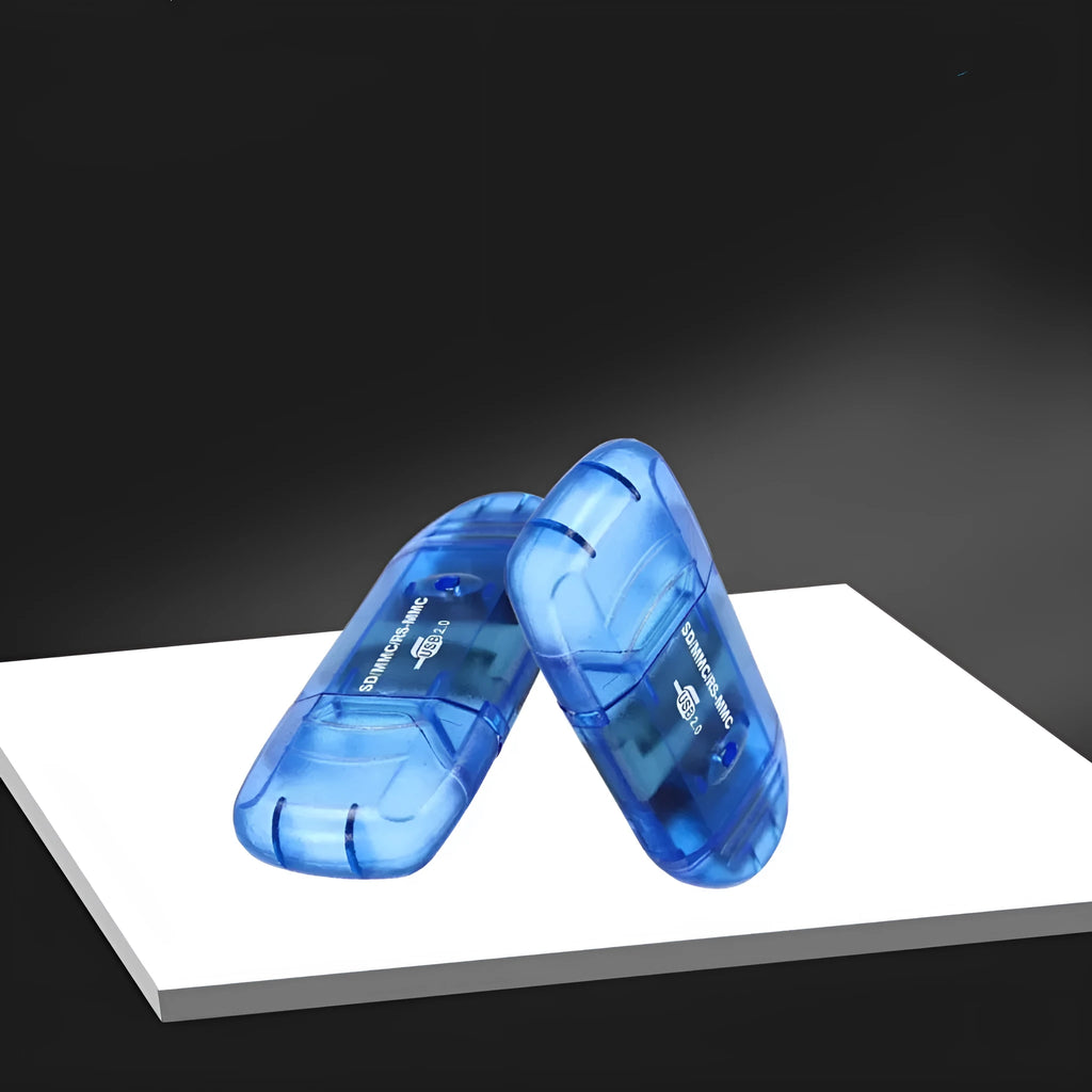 Transparent USB card reader with LED light and SD card slots on a desk.