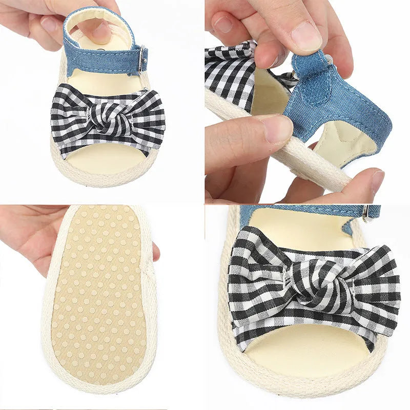 White and black Velcro baby toddler shoes for ages 0-18 months, showing low tube height design.
