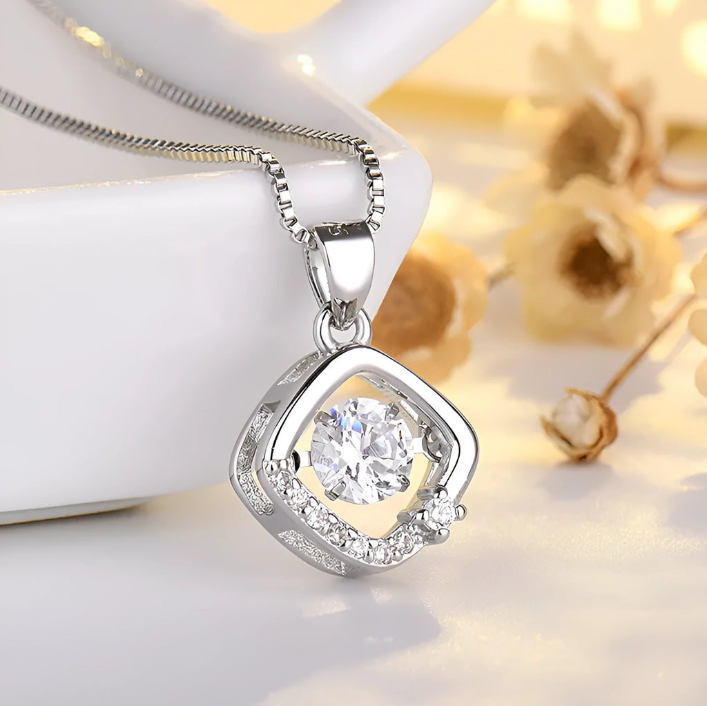 Sterling silver heart necklace with crown and bow design in rose gold or silver finish