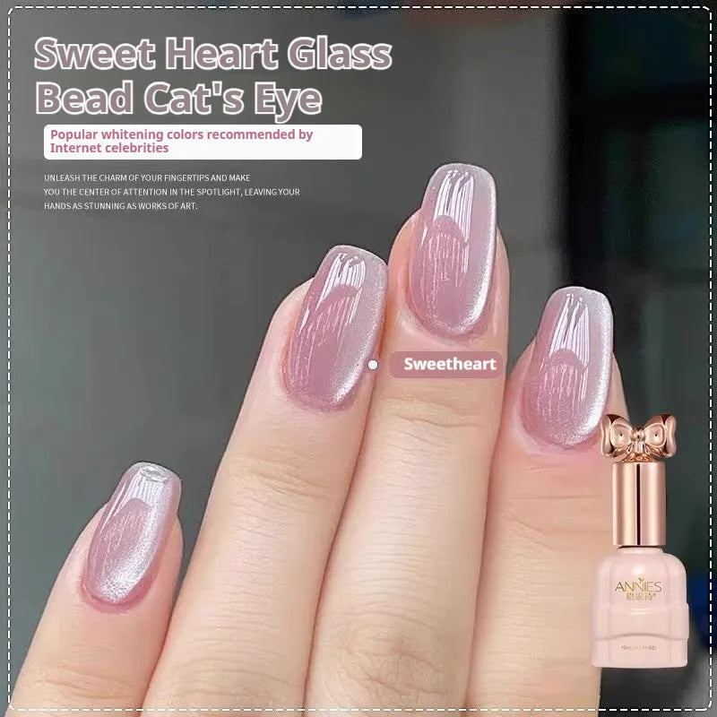 Micro glass bead cat's eye gel nail polish bottle showing cat's eye visual effect