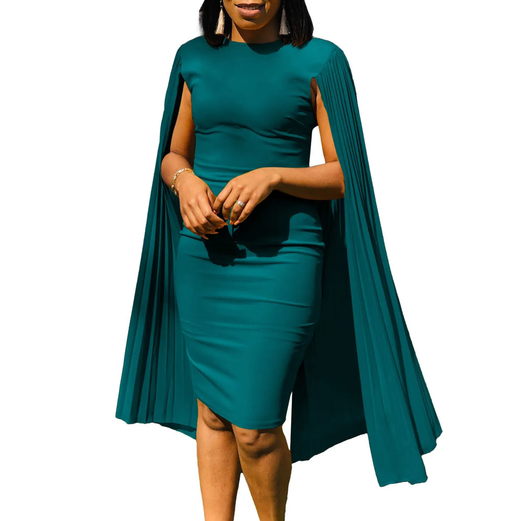 Yellow formal evening gown with round neck, long sleeves, high waist, and pleated skirt on a mannequin.