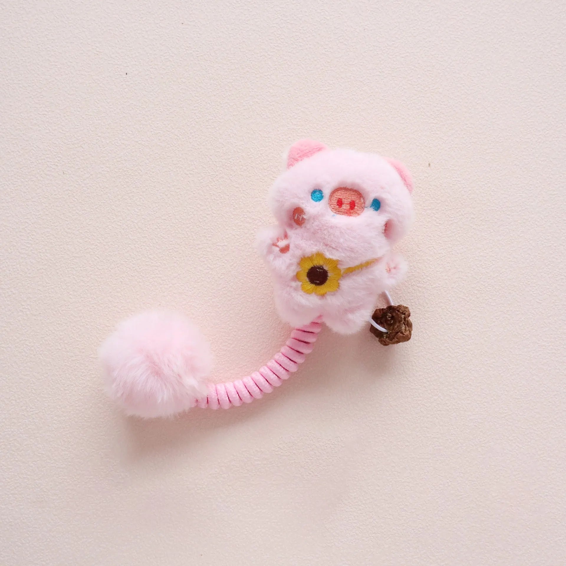 Set of interactive cat toys including a plush animal, silvervine fruit, a spring, and a fuzzy ball.