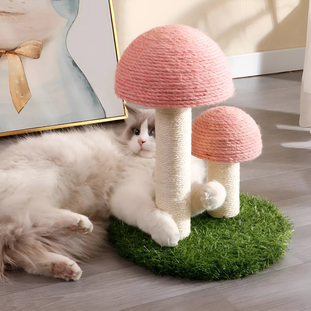 Pink mushroom-shaped cat scratching post with natural sisal cap and pole for small cats