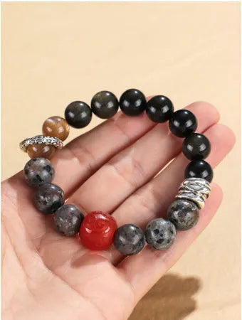 Handcrafted gold obsidian and red agate stone bracelet with Wukong pattern design