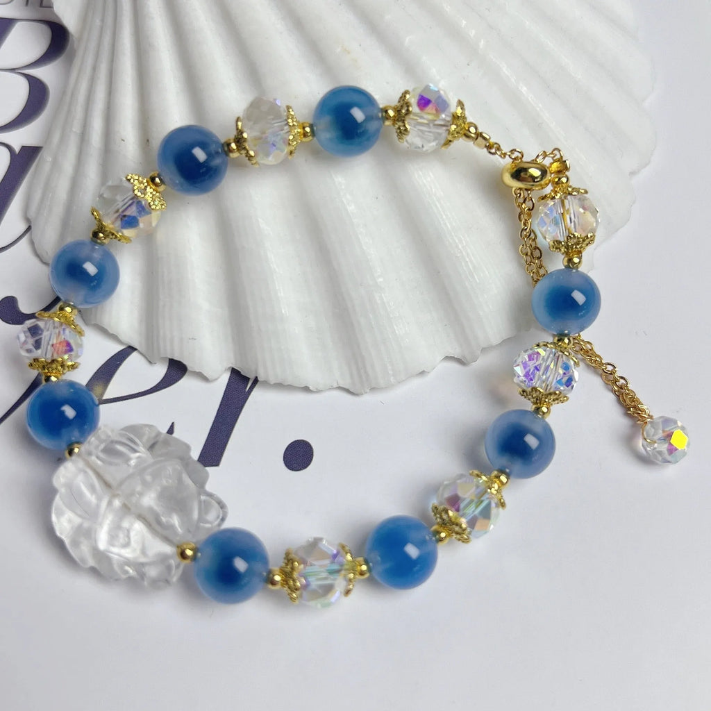 Handmade blue glazed agate nine tail fox bracelet on white background