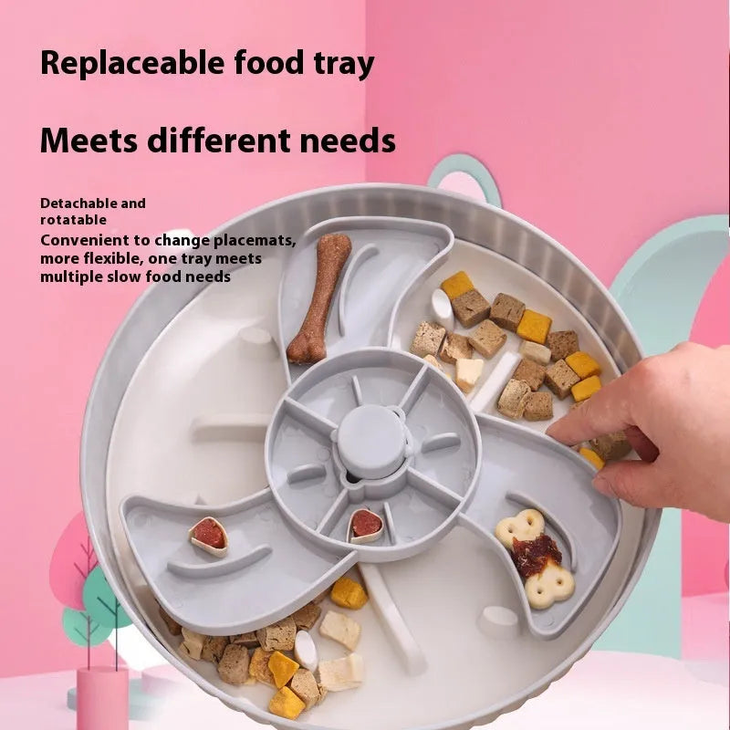 Interactive pet slow feeder bowl with rotating game board and textured silicone pad in assorted colours.