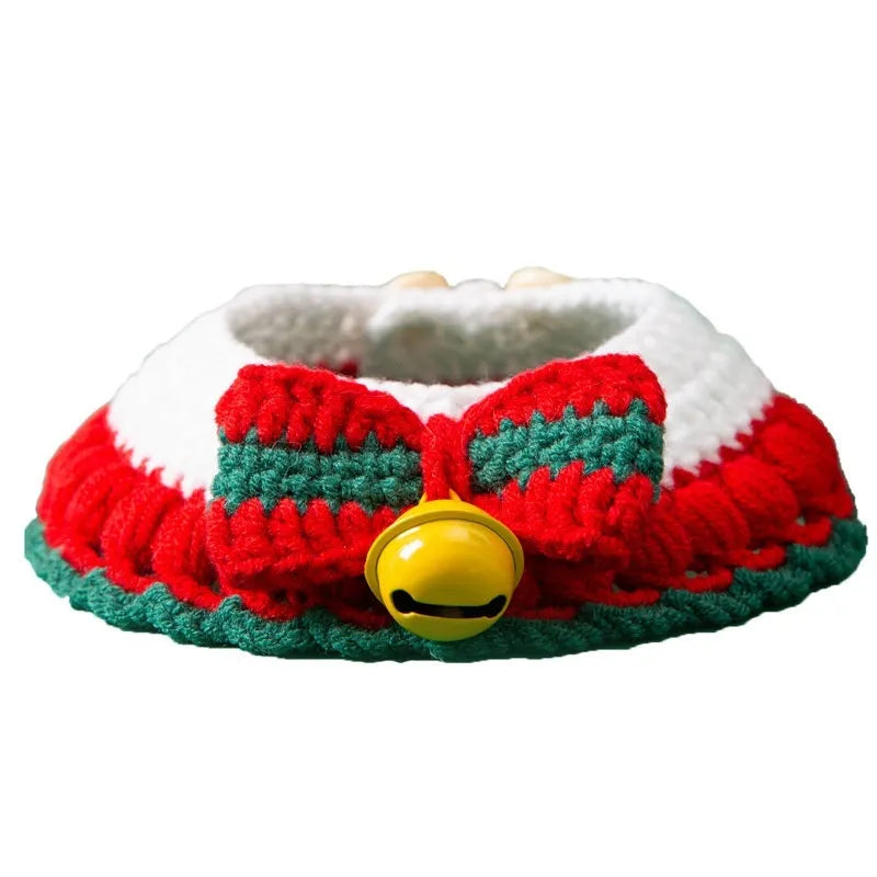 Hand knitted Christmas pet collar for cats made from milk cotton yarn with adjustable sizing and festive bow design