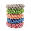 Cotton braided ring dog chew toy approximately 18cm in diameter with knot details