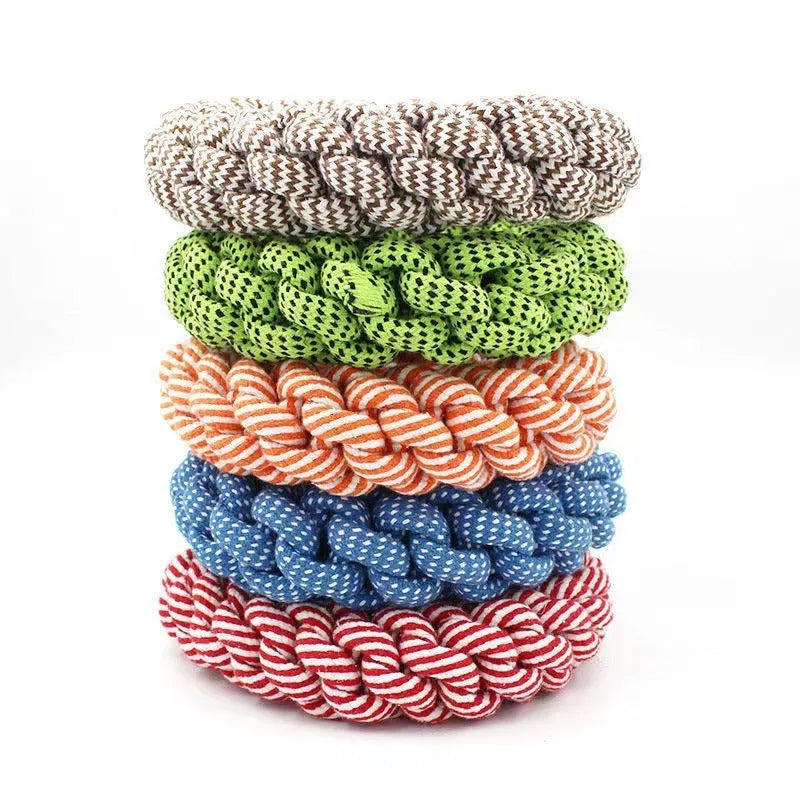 Cotton braided ring dog chew toy approximately 18cm in diameter with knot details