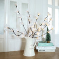 Pink LED phalaenopsis branch decorative light, 65 cm long, for indoor bedroom use.