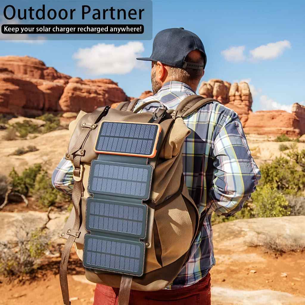 Black outdoor solar power bank with a solar panel, USB ports, and an LED light on a soft leather exterior.