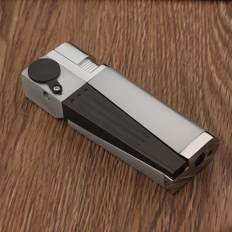Silver foldable metal pipe lighter in open position showing flame mechanism and storage compartment.