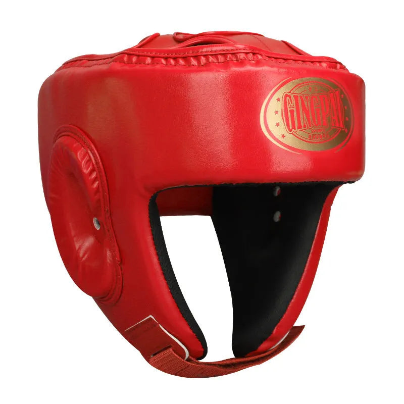 Red fully enclosed boxing helmet with jaw protection showing vertical style design