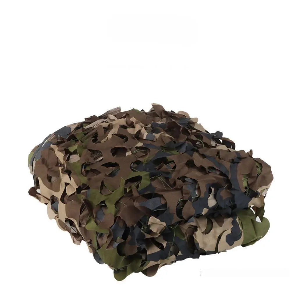 Green camouflage netting set on grass showing textured pattern for sunshade and concealment.