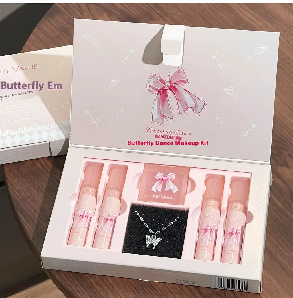 Pink Butterfly Box makeup set with four lip muds, a powder blusher, and a necklace