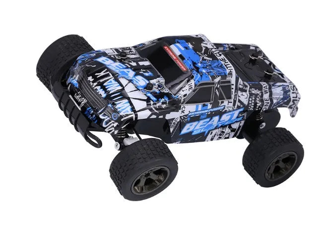 Blue 1:18 scale remote control drift car with 2.4GHz transmitter on black surface