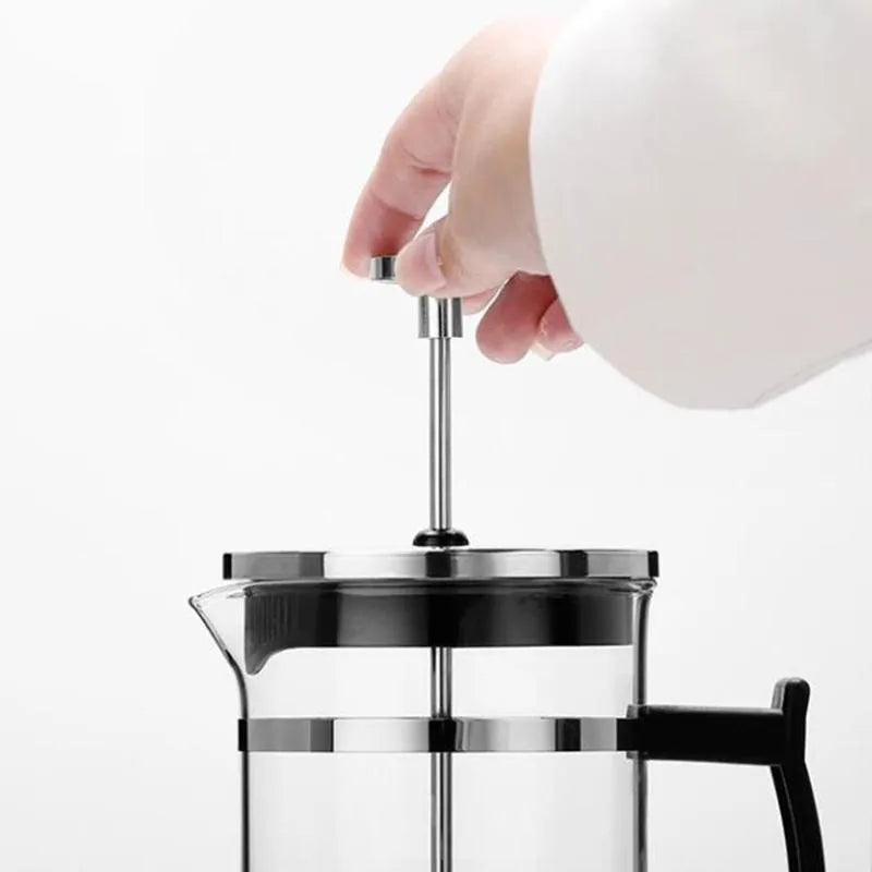 Compact glass pour-over coffee maker with stainless steel filter, 350ml capacity, 10cm wide.