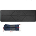 TPE yoga mat in bamboo blue with body position line, 6mm thick, rolled out on a wooden floor