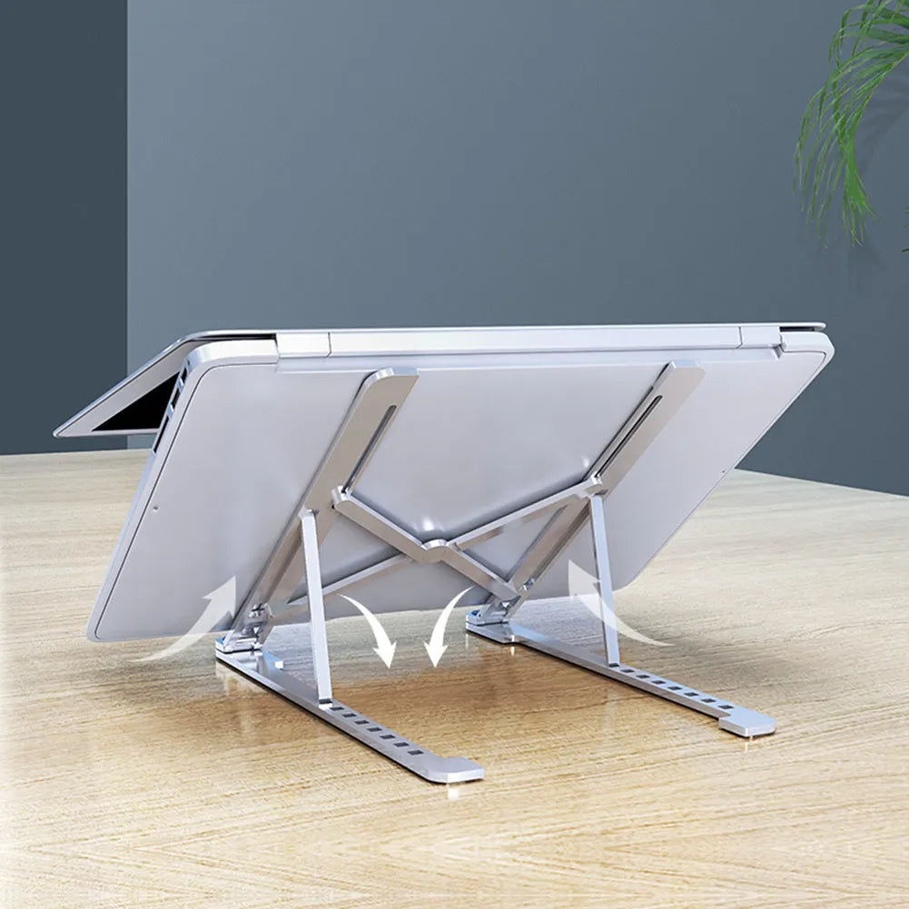 Foldable aluminium laptop stand in silver, shown open for use and folded for storage.