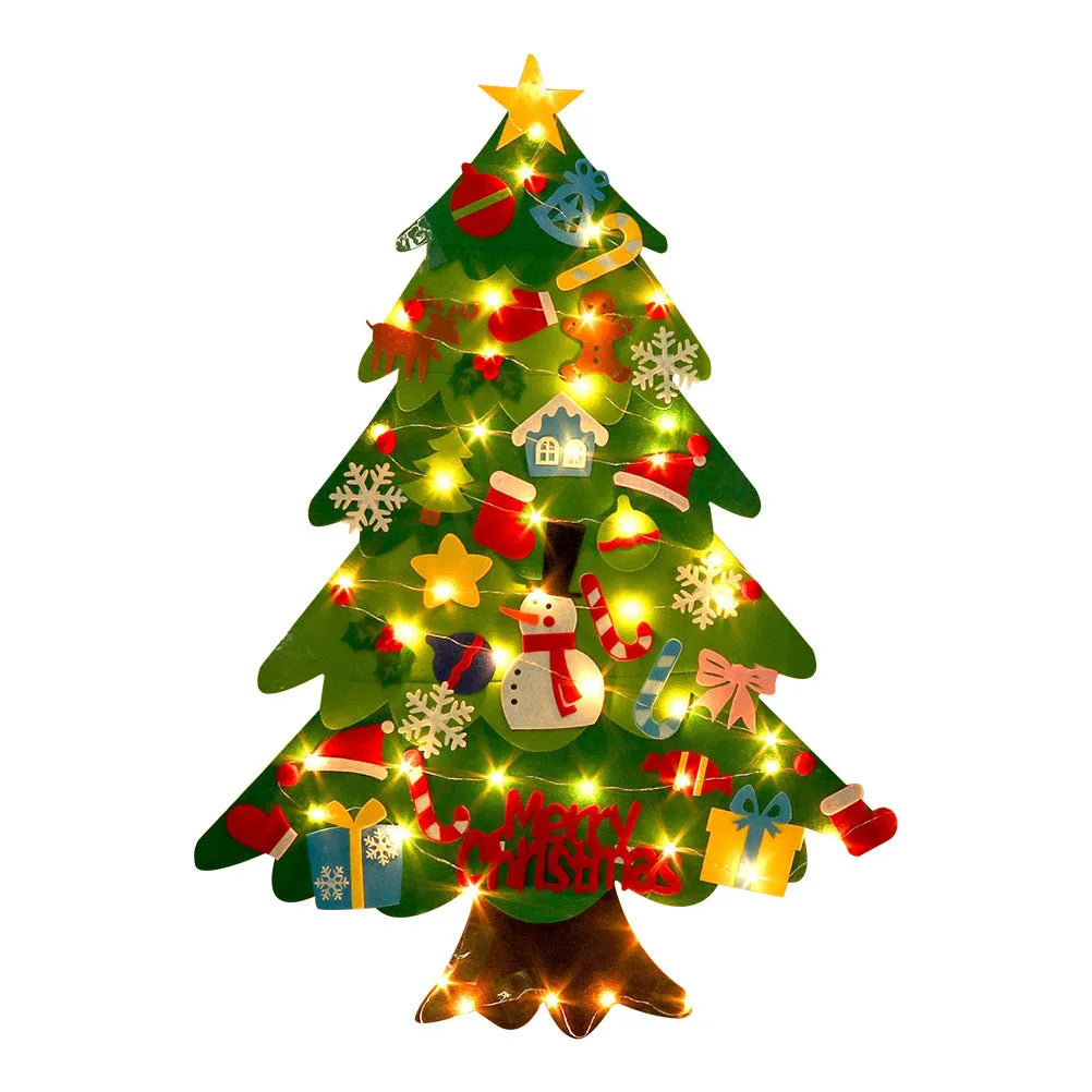 Green DIY felt Christmas tree with fairy lights and ornaments on a white wall with decorations attached