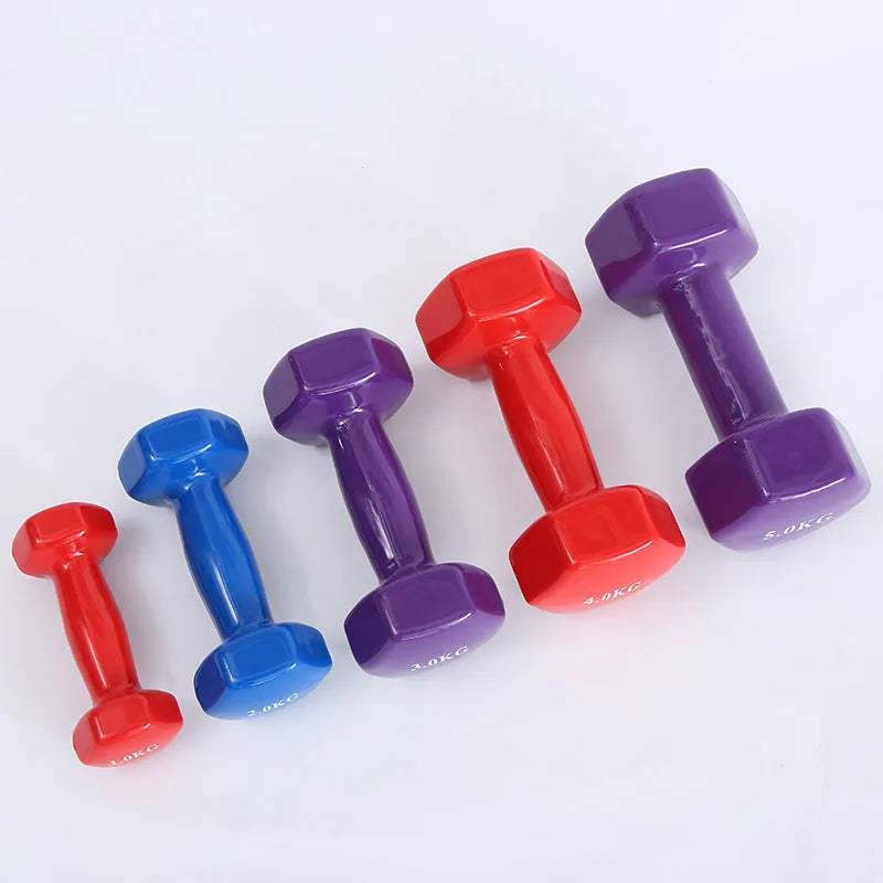 A set of bright red and blue plastic fitness dumbbells with a glossy, rubber-coated surface.