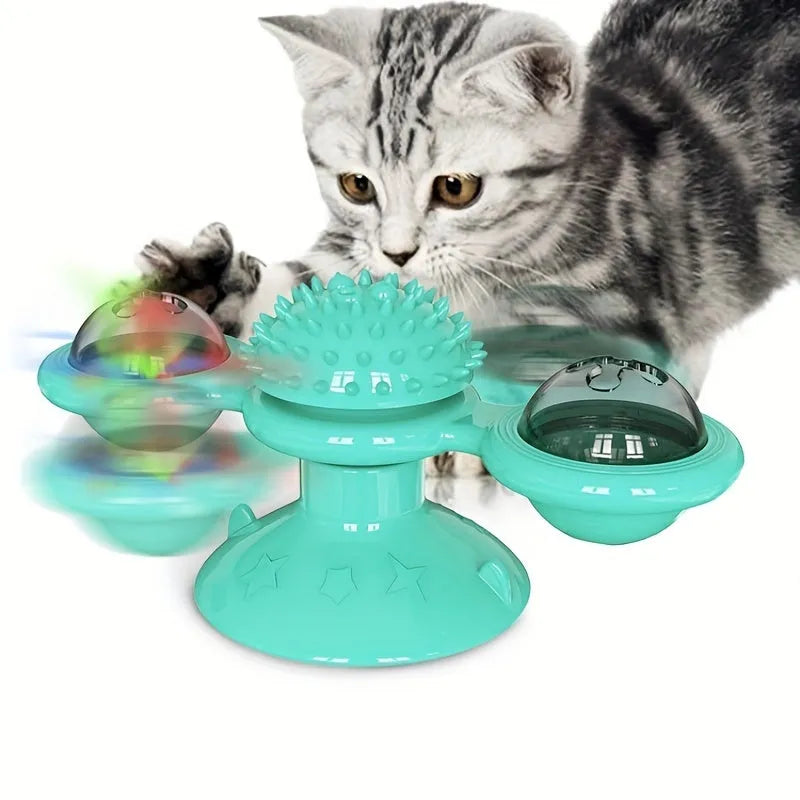 Rotating windmill cat toy with LED light and catnip balls on a white wall