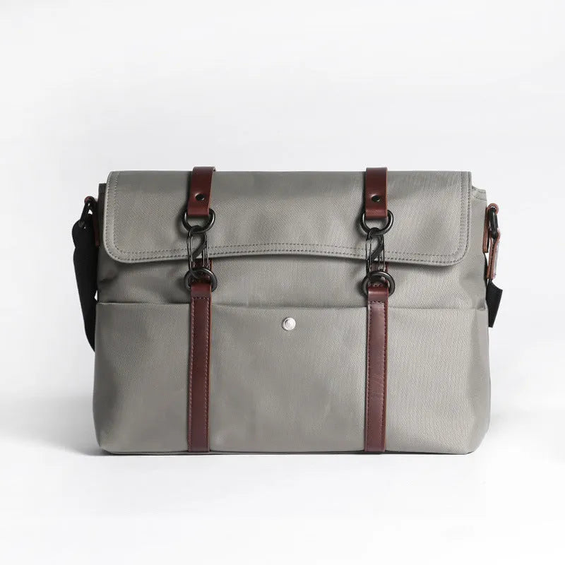 Men's waterproof business tote bag in black, cross-section square shape with zipper closure and soft handles