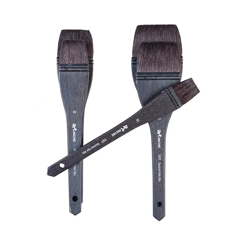 Set of five grey squirrel hair makeup brushes with wooden handles in different sizes from 30mm to 70mm wide.