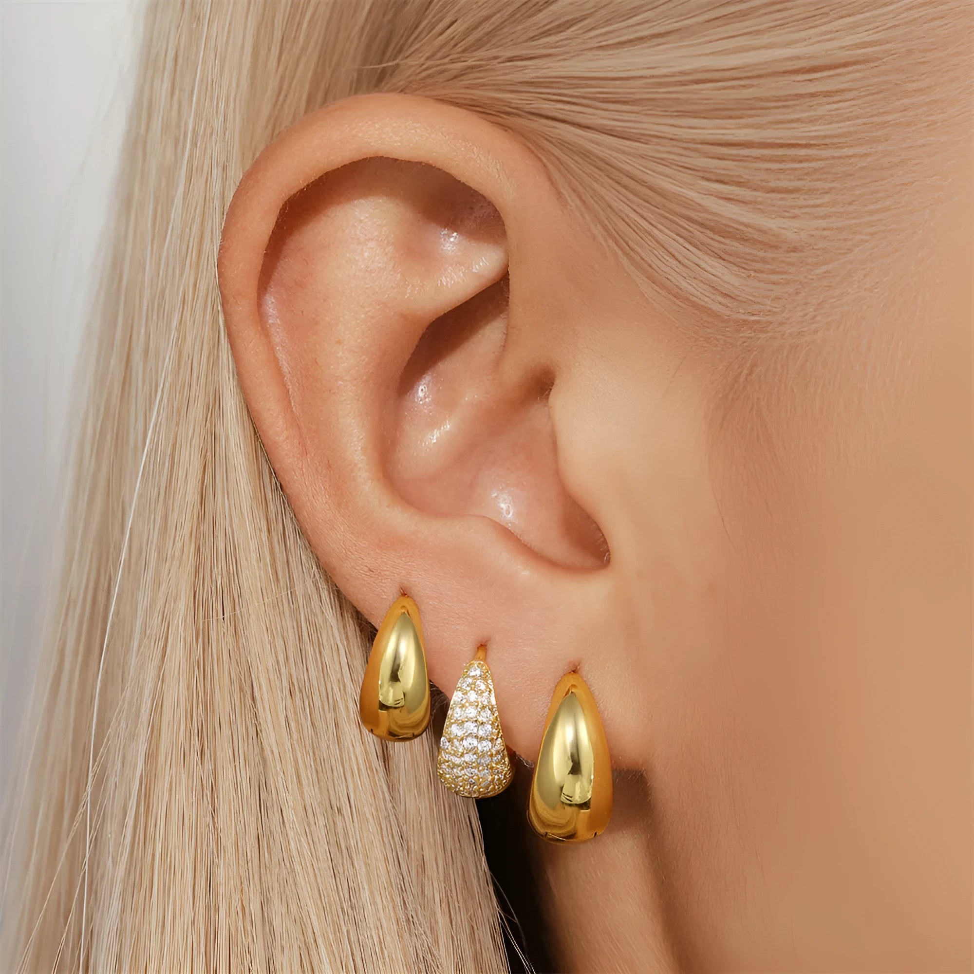 Golden brass diamond earclip earrings with geometric round design on copper base