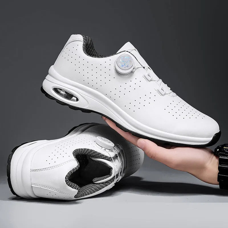 Men's low top black mesh casual shoes with white composite sole and cross shoulder straps.