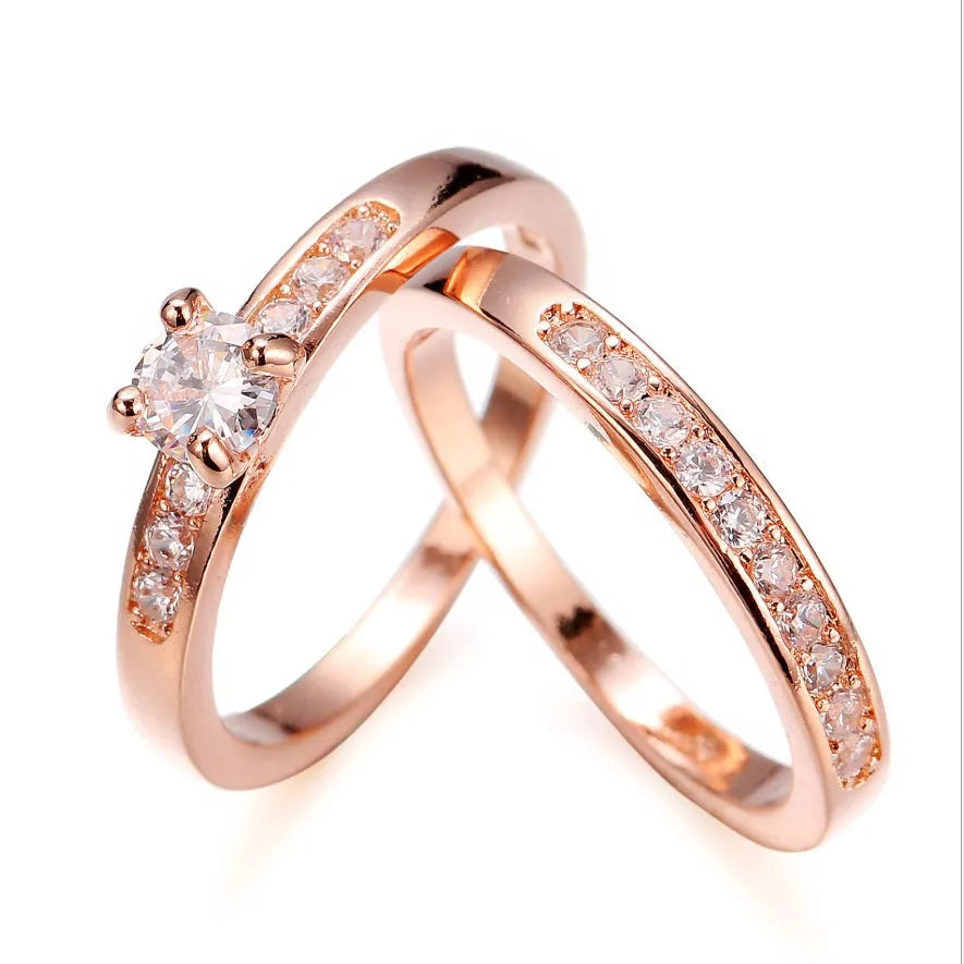 Rose gold ring with diamonds on copper base, available in sizes 5 to 12, shown on a neutral background