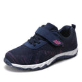 Women's low-top grey purple wedge heel casual shoes with velcro strap on soft mesh upper.