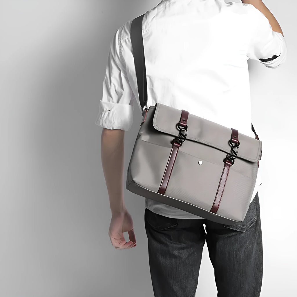 Men's waterproof business tote bag in black, cross-section square shape with zipper closure and soft handles