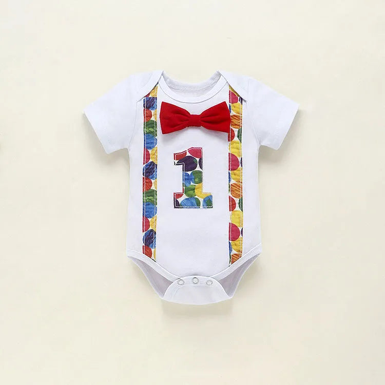 Cotton baby romper set with dinosaur print in blue or green, shorts length with ruffles and straps