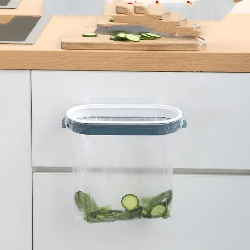 Blue plastic kitchen cabinet garbage bag storage rack mounted on wall