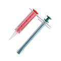 Two silicone pet pill shooters with soft tips for feeding medication to cats and dogs.