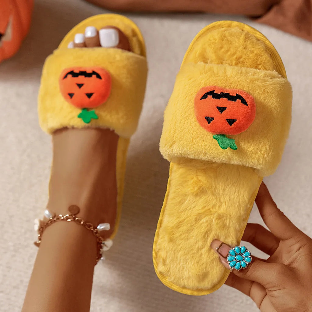 White and yellow Halloween cartoon pumpkin plush open-toe slippers on anti-slip PVC sole.