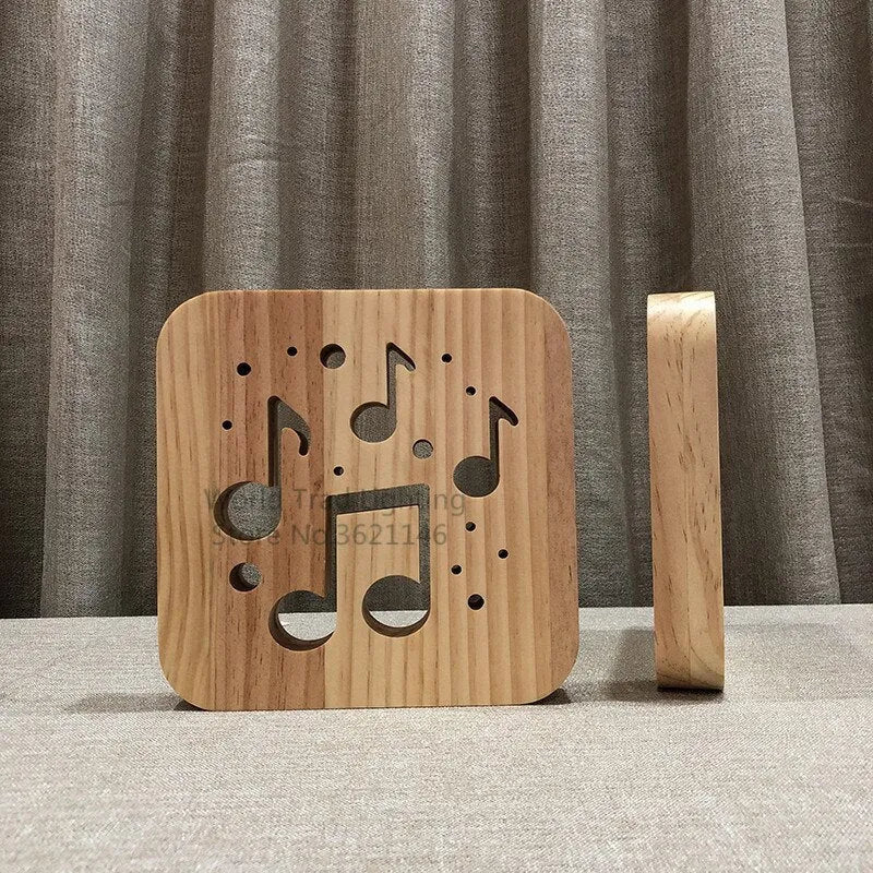 A cubic wooden LED atmosphere lamp with warm white light, shown with a USB cable.