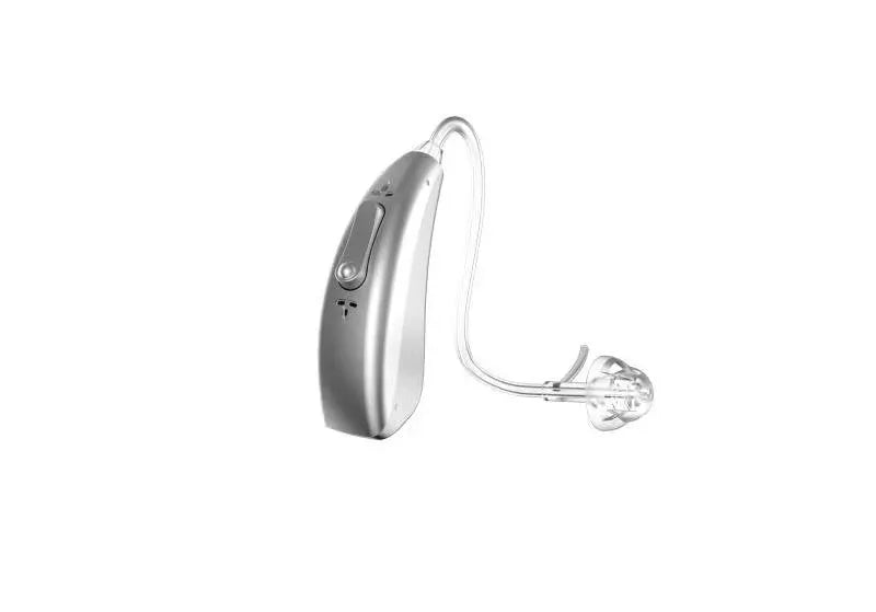 Wireless invisible rechargeable hearing aid with USB charging case on a table