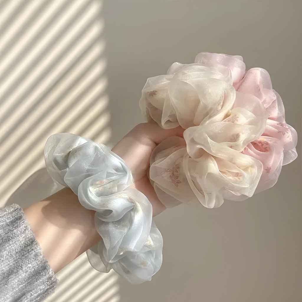 Mesh Sense bun large intestine hair band in milky white, made from soft cloth with a natural style, for women