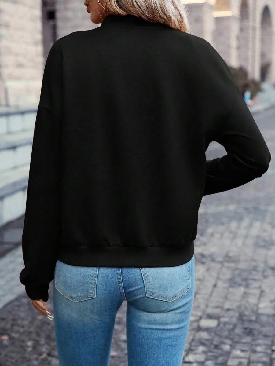 Black women's zip jacket with faux pockets and long sleeves showing front view