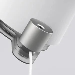 White desktop bladeless fan with USB power and humidification spray on a desk