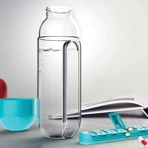 Creative wrist capsule water cup with medicine box 600ml in black, showing lid with integrated pill compartment