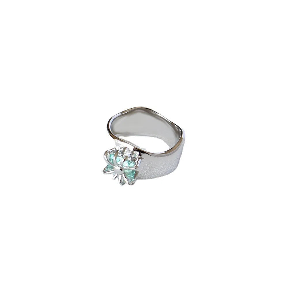 Copper platinum plated couple ring with three-ring gem design in style A on a neutral background